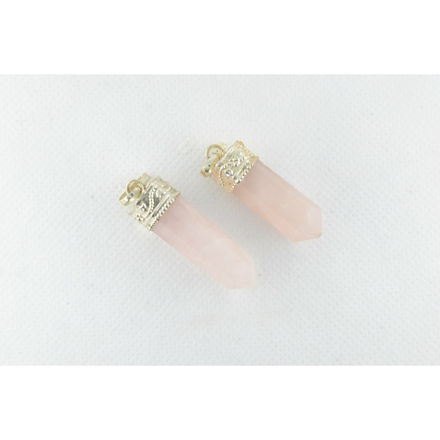Rose quartz trailer (energy tip) with silver setting