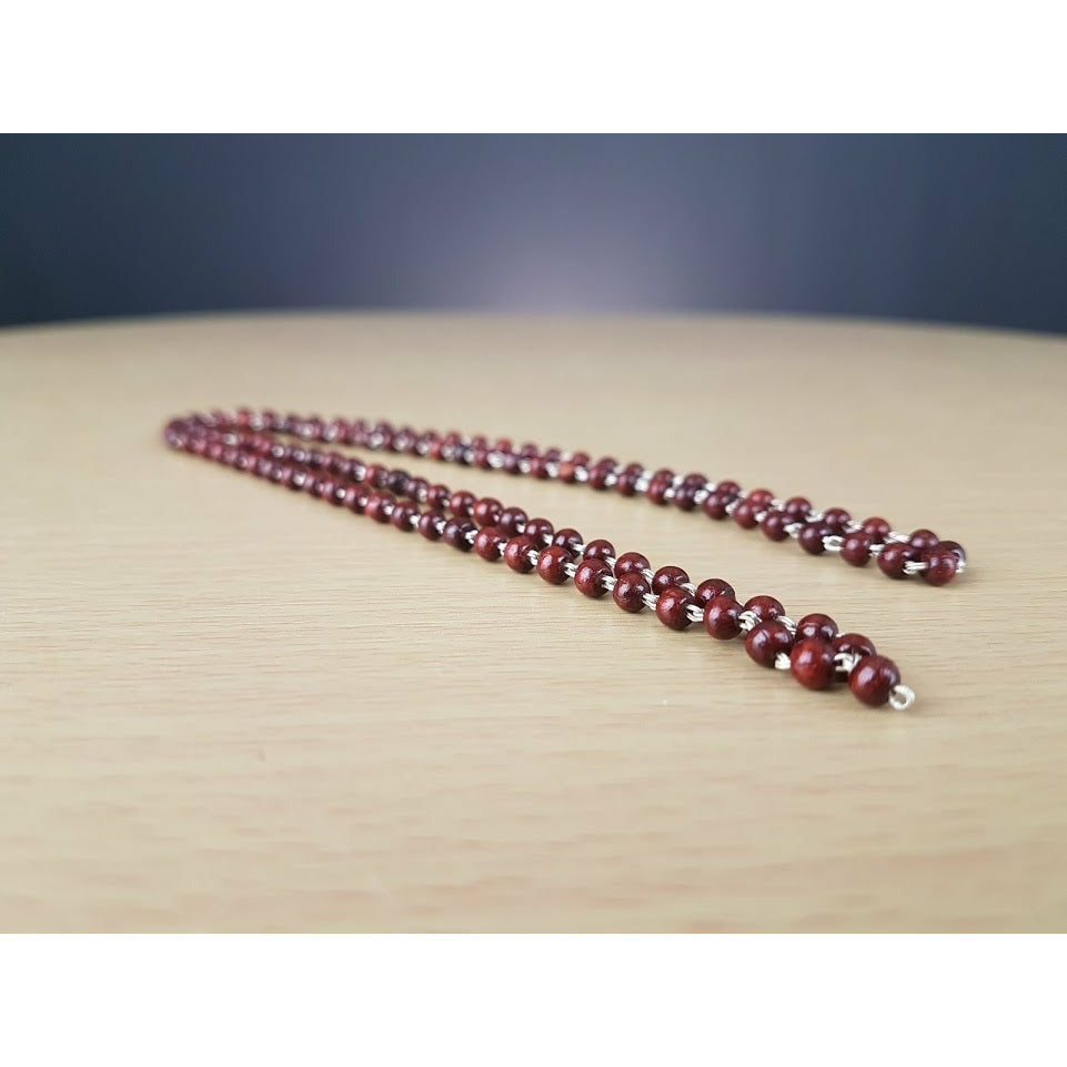 Beautiful mala made of fine red sandalwood - set in fine silver to the mala