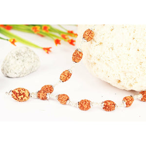 3-Augen-Rudraksha-Mala in Silber gefasst zur Stärkung des inneren Feuers